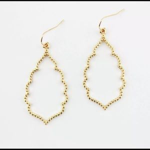 Gold tone tear drop shape dangle earrings